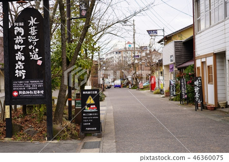 Landscape of Monzen-cho street of Aso Ichinomiya-cho providing spring water "water base" of Aso mountains Landscape of Monzen-cho street of Aso Ichinomiya-cho providing spring water "water base" of Aso mountains 46360075