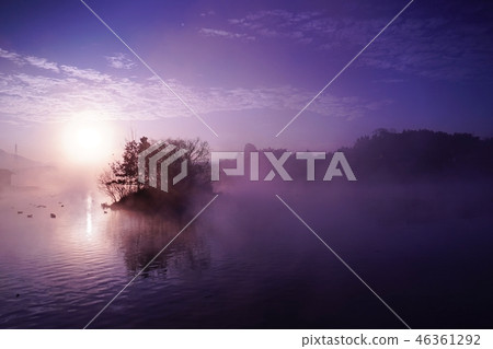Floating island area waterside park at the time of sunrise floating in the morning mist 46361292