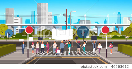 people crowd holding placard and megaphone on crosswalk modern city street skyscraper downtown road 46363612