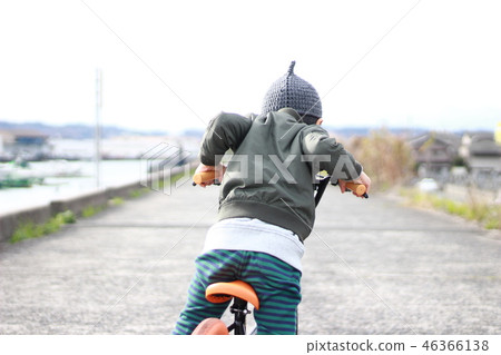 Boy practicing bicycle Boy practicing bicycle 46366138