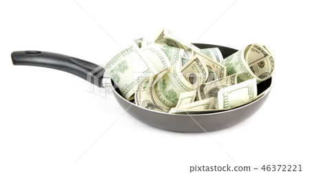 dollars in frying pan 46372221