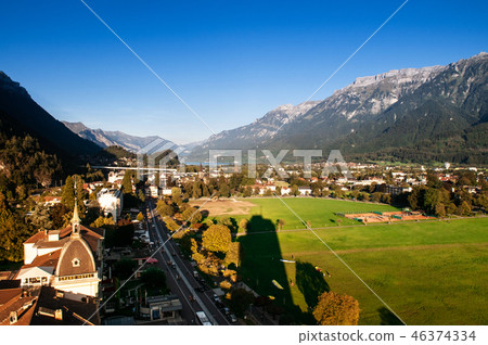 Evening scene field and Swiss alps in Interlaken Evening scene field and Swiss alps in Interlaken 46374334