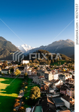 Evening street scene of old buildings Interlaken Evening street scene of old buildings Interlaken 46374337