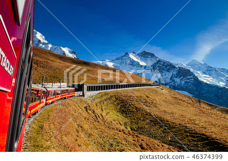 Jungfrau railway train at climbing to Jungfraujoch Jungfrau railway train at climbing to Jungfraujoch 46374399