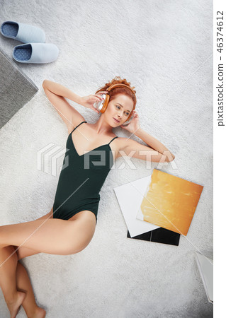 the image of resting sexy woman listening to vinyl the image of resting sexy woman listening to vinyl 46374612