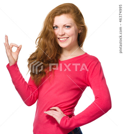 Woman is showing OK sign 46374995