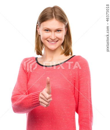 Woman is showing thumb up gesture Woman is showing thumb up gesture 46375018