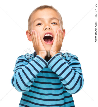 Portrait of an astonished little boy Portrait of an astonished little boy 46377127