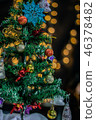 Decorated christmas tree with the bokeh background 46378482