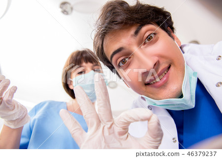Concept of treating teeth at dentists Concept of treating teeth at dentists 46379237