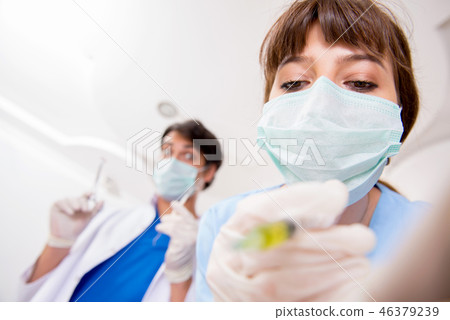 Concept of treating teeth at dentists 46379239