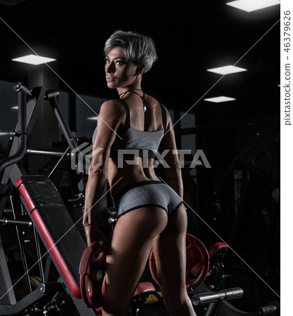 Sexy athletic girl workout in gym. Sexy athletic girl workout in gym. 46379626