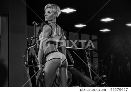 Sexy athletic girl workout in gym. Sexy athletic girl workout in gym. 46379627