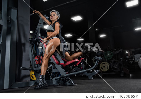 Sexy athletic girl workout in gym. Sexy athletic girl workout in gym. 46379657