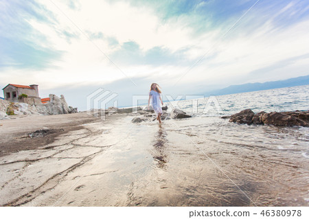 Refreshing walks by the sea in the summer 46380978