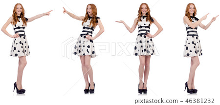 Young woman in polka dot dress isolated on white Young woman in polka dot dress isolated on white 46381232