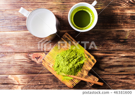 Top view of a cup of Matcha tea with milk jug. Top view of a cup of Matcha tea with milk jug. 46381600