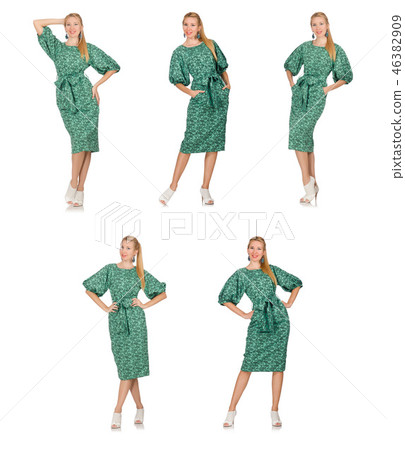 Young woman in green dress isolated on white 46382909