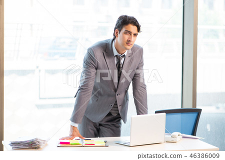 Young successful businessman working at the office  46386009