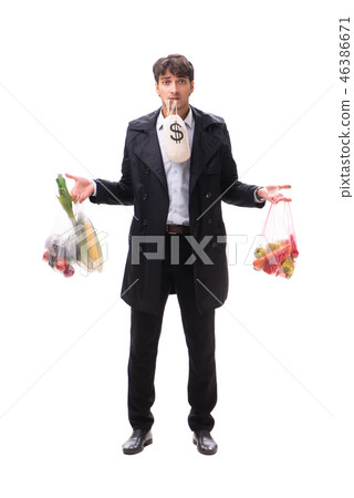 Young handsome man with vegatables in shopping concept Young handsome man with vegatables in shopping concept 46386671