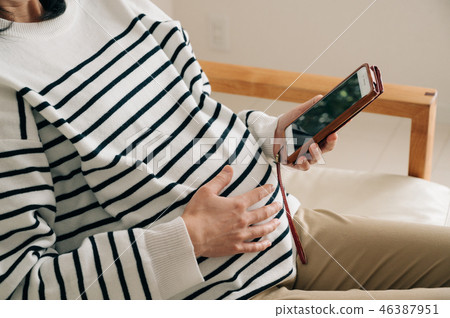 Pregnant woman pregnancy maternity photo 46387951