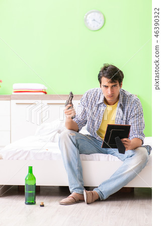 Young man sad in unhappy love concept Young man sad in unhappy love concept 46390322