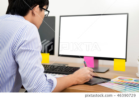 designer Editor at work drawing sketches a new project on graphi 46390729