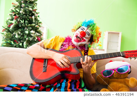Funny clown in Christmas celebration concept Funny clown in Christmas celebration concept 46391194
