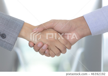 Businessman hands shake agreement. 46392192
