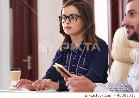 Business lady checking e-mails 46392313