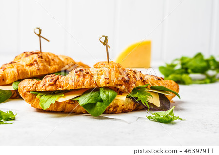 Croissants with cheese and salad  46392911