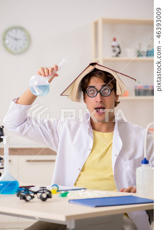 Funny crazy chemist doing experiments and tests Funny crazy chemist doing experiments and tests 46393009