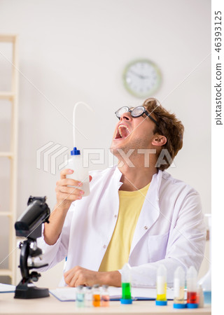 Funny crazy chemist doing experiments and tests 46393125