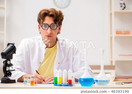 Funny crazy chemist doing experiments and tests Funny crazy chemist doing experiments and tests 46393199