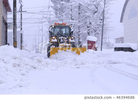 Snowplow removing snow from the road 46394686
