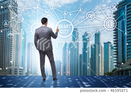 Concept of smart city with businessman pressing buttons Concept of smart city with businessman pressing buttons 46395871