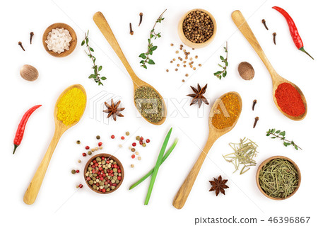mix of spices in wooden spoon isolated on a white background. Top view. Flat lay. Set or collection 46396867