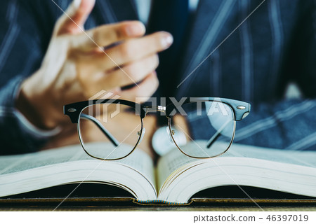Book and glasses Business image 46397019