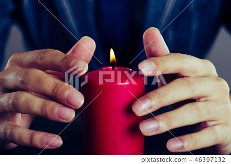 Red candle and men 46397132