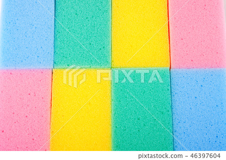 Background of colored kitchen sponges for washing dishes Background of colored kitchen sponges for washing dishes 46397604