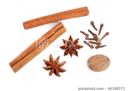 Cinnamon sticks with star anise, nutmeg and clove isolated on white background. Top view Cinnamon sticks with star anise, nutmeg and clove isolated on white background. Top view 46398571