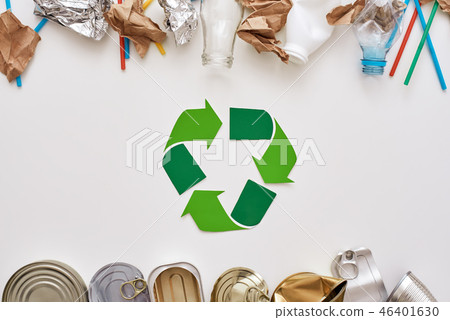 Save the world. Canned garbage, sorted separately near recycle symbol Save the world. Canned garbage, sorted separately near recycle symbol 46401630