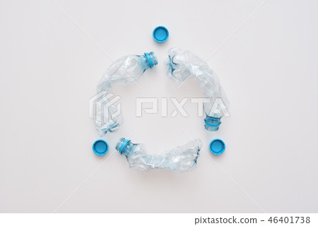 Step to green life. Circle of crumple plastic bottles 46401738