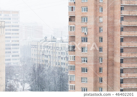 snowfall in residential district of city 46402201