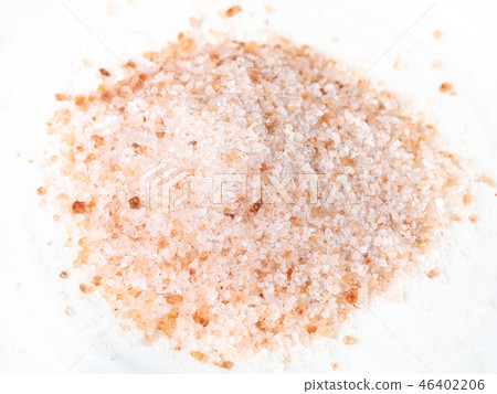 handful of ground pink himalayan salt on plate handful of ground pink himalayan salt on plate 46402206