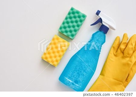 Good housekeeping. Spray bottle and other items isolated 46402397