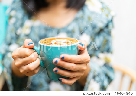 Latte art coffee cup in green glass 46404840