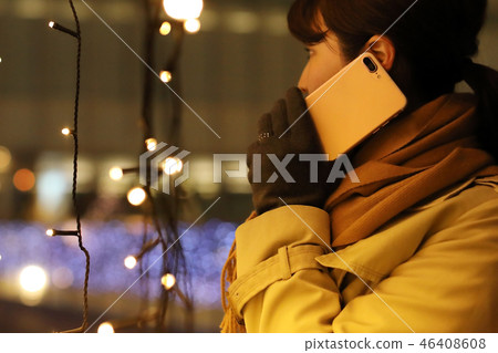 Woman talking on smartphone Woman talking on smartphone 46408608