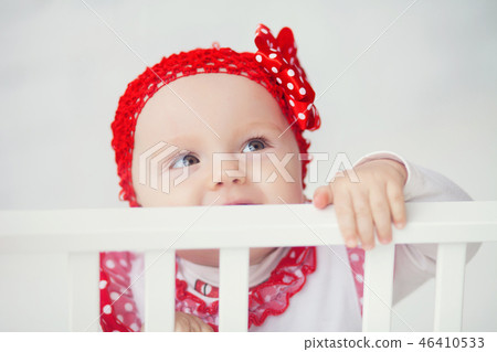baby with red cap