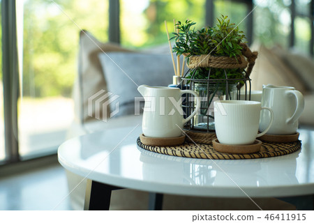 Closeup set of white ceramic cup and mug of coffee 46411915